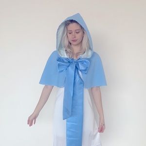 Baby blue capelet with satin bow